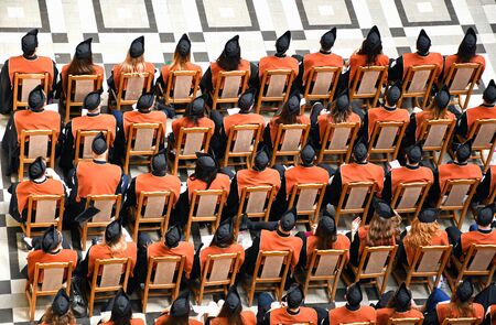 Students of the university at the graduationの写真素材