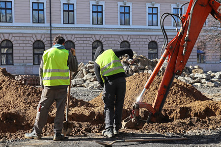 Men are working at the road construction
