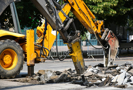 Breaking the asphalt on the road construction