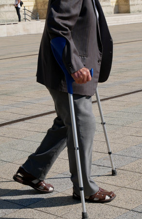 Old man with walker on the streetの写真素材