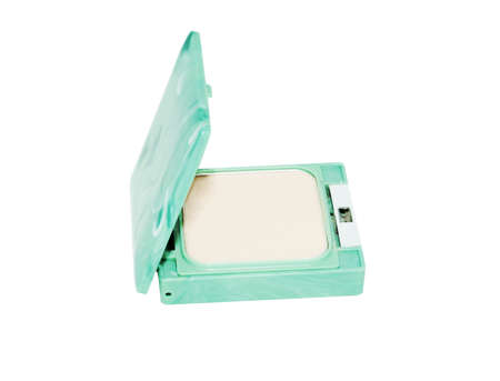 Compact pressed powder in green rectangle box isolated on white background.の写真素材