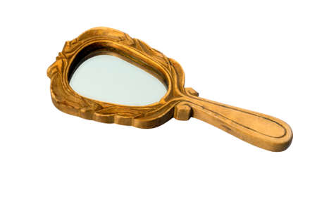 Vintage old hand mirror in wooden frame isolated on white bbackgroundの写真素材