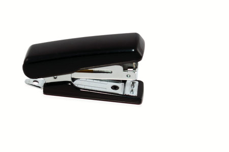 Stapler paper on a white background with soft shadows.
