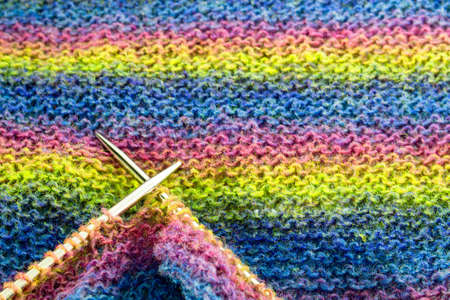 colorful stripes knitted wool background texture close-upの写真素材