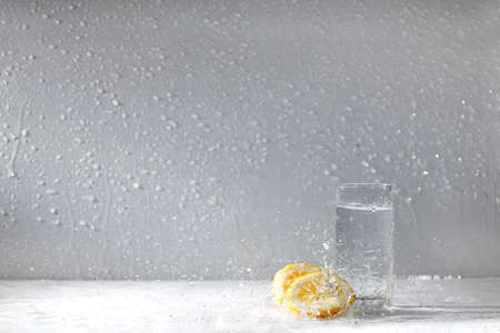 Lemon water drops fresh citrus yellow freshnessの写真素材