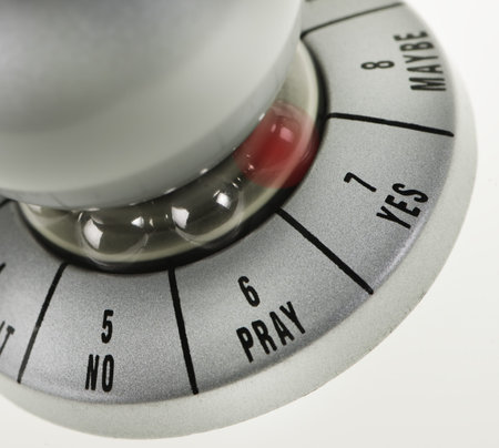 Close-up of device to help decision making