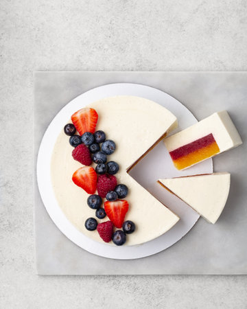 Berry mousse cake Decorated with berries. white background.の写真素材