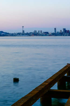 Seattle Cityscape At Dusk With Abandoned Steel Pier In Foregroundの写真素材