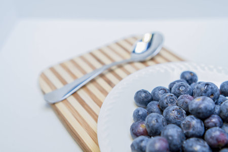 Fresh ripe blueberries served on a plateの写真素材