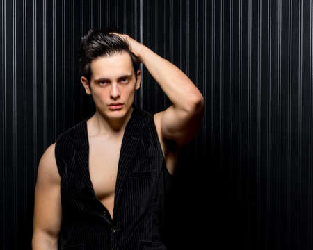 Athletic Muscular Hunk Runs Fingers In Hairの写真素材