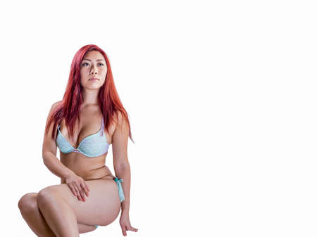 Attractive AsianAmerican young female in a twopiece bikini.の写真素材