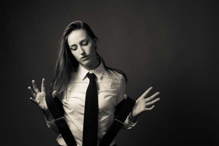 Slender caucasian female editorial style portrait of masculinityの写真素材