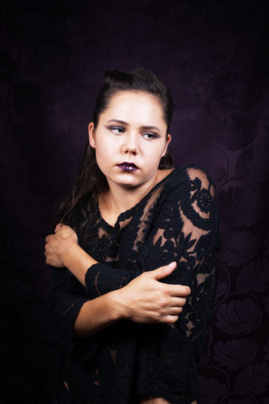 Dramatic portrait of  female in black lacy blouseの写真素材
