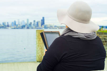 Beautiful middle aged woman resumes lifestyle post-surgery for breast cancerの写真素材