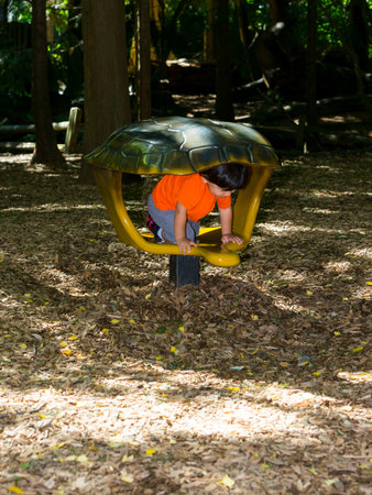 Energetic hispanic toddler having funの写真素材