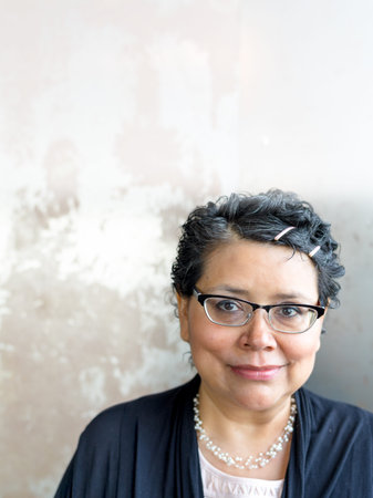 Happy Hispanic Female Portrait With Copy Message Spaceの写真素材