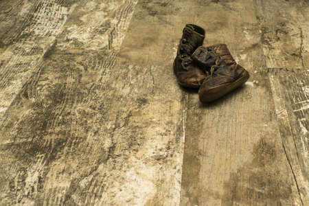 Young Boys Worn Handmade Leather Bootsの写真素材