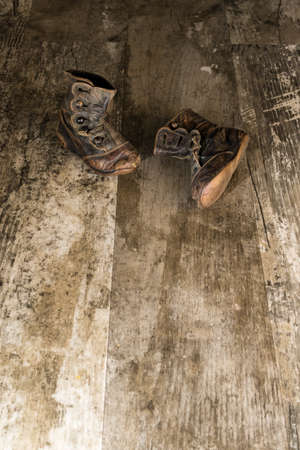 Young Boys Worn Handmade Leather Bootsの写真素材