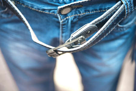 Man trousers with the unzipped strap  の写真素材