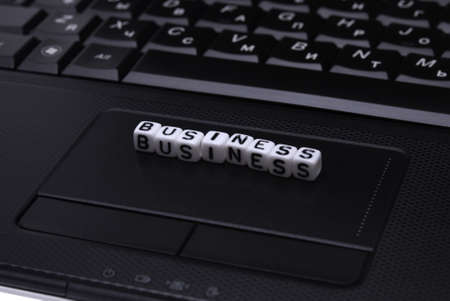 Word business from blocks on a notebookの写真素材