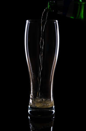 pouring beerの写真素材