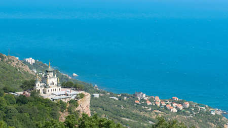 Church on a mountain plateau with a wonderful view at the seasideの写真素材