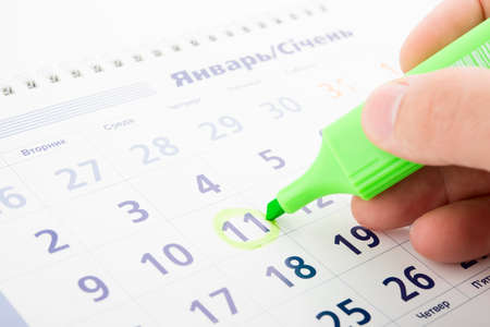 Businessman planning of work time, close up.の写真素材