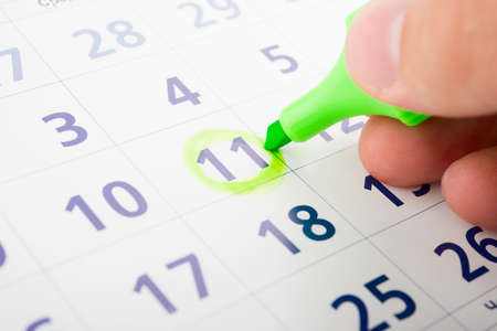 Businessman planning of work time, close up.の写真素材