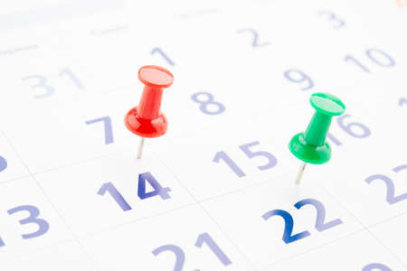 push pin in a calendarの写真素材