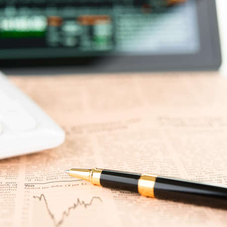 Businessman workplace with digital tabletの写真素材