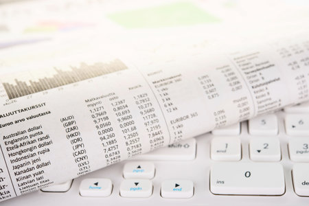 Newspaper on a white keyboard