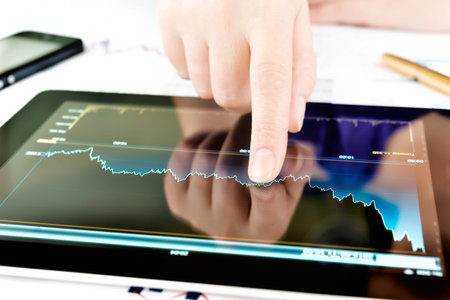 Businesswoman work with documents and tablet pc