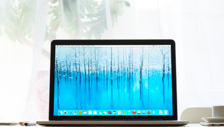 SIMFEROPOL, RUSSIA - NOVEMBER 16, 2014:  Photo shoot of Macbook Pro.  MacBook is a brand of notebook computers manufactured by Apple Inc.のeditorial素材