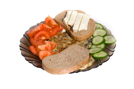 Health breakfast with bread, eggs, cheese and vegetables.の写真素材