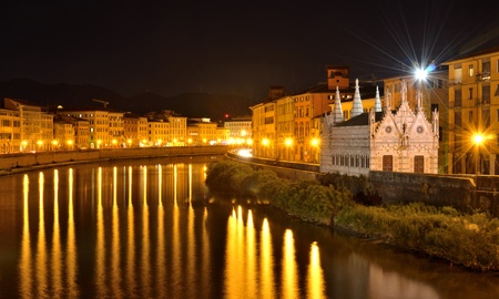 The Santa Maria della Spina, a gothic church, is located on the banks of the River Arno, Pisa, Tuscany, Italyの写真素材