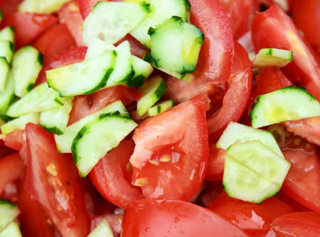Tomato and cucumber vegetarian saladの写真素材