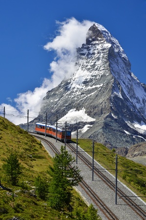 The Gornergratbahn is a 9 km long gauge mountain rack railwa in Switzerland Alps. It leads from Zermatt up to the Gornergrat (3089 m).の写真素材