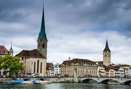 ZURICH, SWITZERLAND - AUG 16  Image with largest swiss city, Zurich in Switzerland  Fraumunster Church and St  Peter tower, symbols of city のeditorial素材
