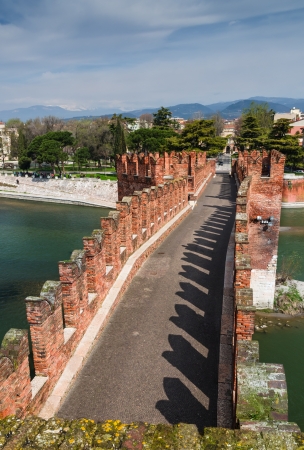 Medieval bridge of Ponte Scaligero in Verona, Italy, built in 14th century near Castelvecchioの写真素材