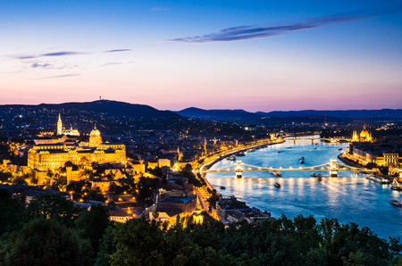 Night view with Szechenyi Chain Bridge on river Danube, Budapest, with Orszaghaz Hungary Parliament building.の写真素材