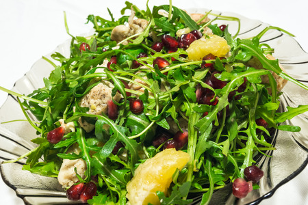 Mix salad with chicken, rucola, Pomegranate, orange and rucola letuceの写真素材