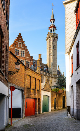 Bruges, Brugge, Belgium. Poortersloge tower, Burgher's Lodge, impressive medieval building of Flanders city.の写真素材