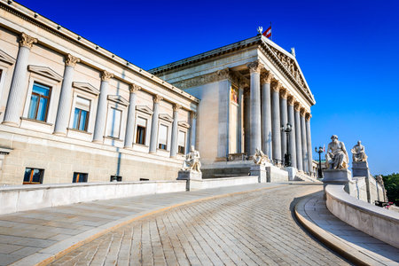 Panoramic view of Austrian parliament building with famous Pallas Athena fountain and main entrance in Vienna, Austriaのeditorial素材
