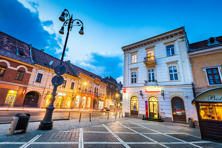 BRASOV, ROMANIA - 24 MARCH 2017: Brasov, Romania - Medieval Main Square, baroque touristic attraction of Transylvania, Eastern Europe.のeditorial素材