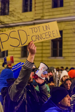 BRASOV, ROMANIA - 1 FEBRUARY 2017: Massive protests in Brasov against planned measures aimed to defend corrupt officials. Some 20.000 people marched through the  Brasov city and 150.000 in Bucharest, Romanian capital and a total of  400.000 all over Romanのeditorial素材
