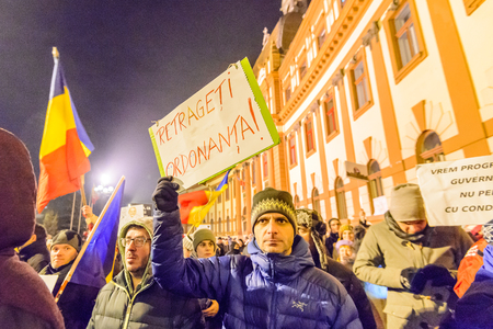 BRASOV, ROMANIA - 1 FEBRUARY 2017: Massive protests in Brasov against planned measures aimed to defend corrupt officials. Some 20.000 people marched through the  Brasov city and 150.000 in Bucharest, Romanian capital and a total of  400.000 all over Romanのeditorial素材
