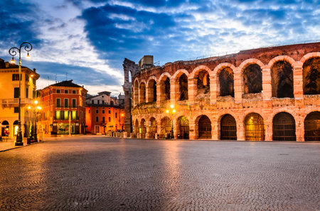 The amphitheatre, completed in 30AD, the third largest in the world, at dusk time. Piazza Bra and...