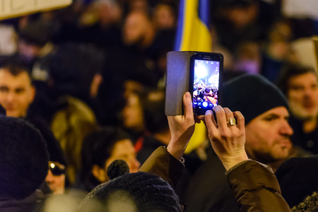 BRASOV, ROMANIA - 1 FEBRUARY 2017: Massive protests in Brasov against planned measures aimed to defend corrupt officials. Some 20.000 people marched through the  Brasov city and 150.000 in Bucharest, Romanian capital and a total of  400.000 all over Romanのeditorial素材