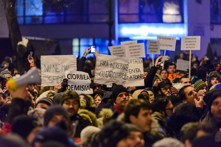 BRASOV, ROMANIA - 1 FEBRUARY 2017: Massive protests in Brasov against planned measures aimed to defend corrupt officials. Some 20.000 people marched through the  Brasov city and 150.000 in Bucharest, Romanian capital and a total of  400.000 all over Romanのeditorial素材