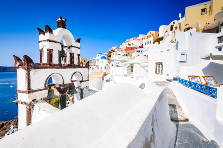 Oia, Santorini - Greece. Famous attraction of white village with cobbled streets, Greek Cyclades Islands, Aegean Sea.の写真素材